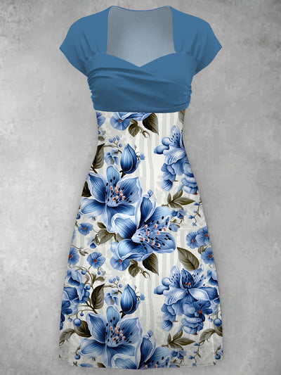 Robe mi-longue élégante rétro à fleurs bleues imprimées, col en V, manches courtes, mode vintage